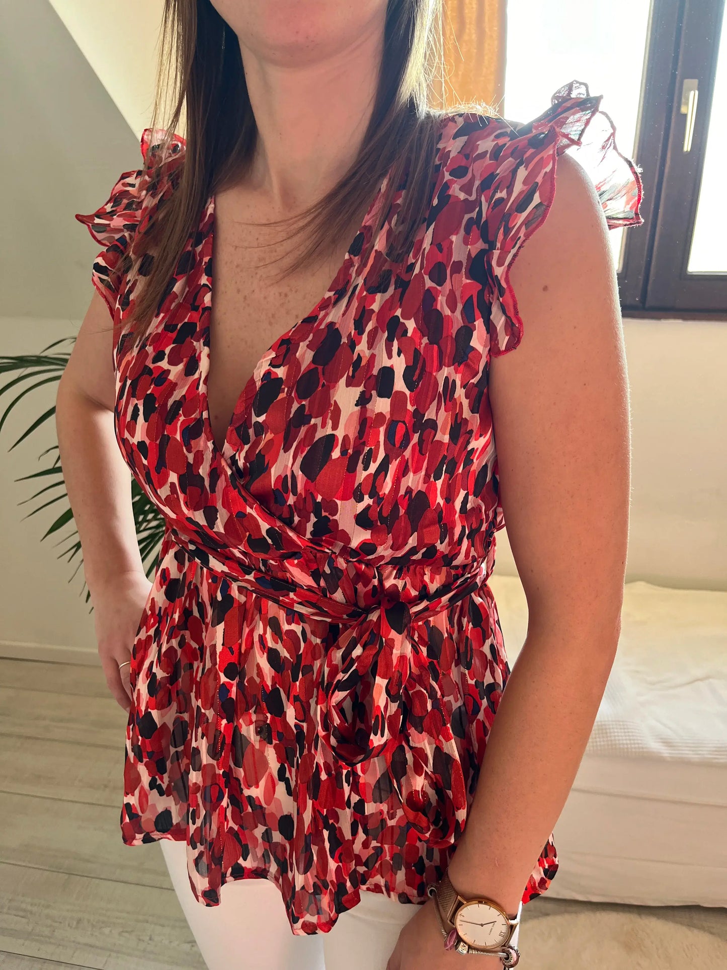 Blouse imprimée sans manches volantée
