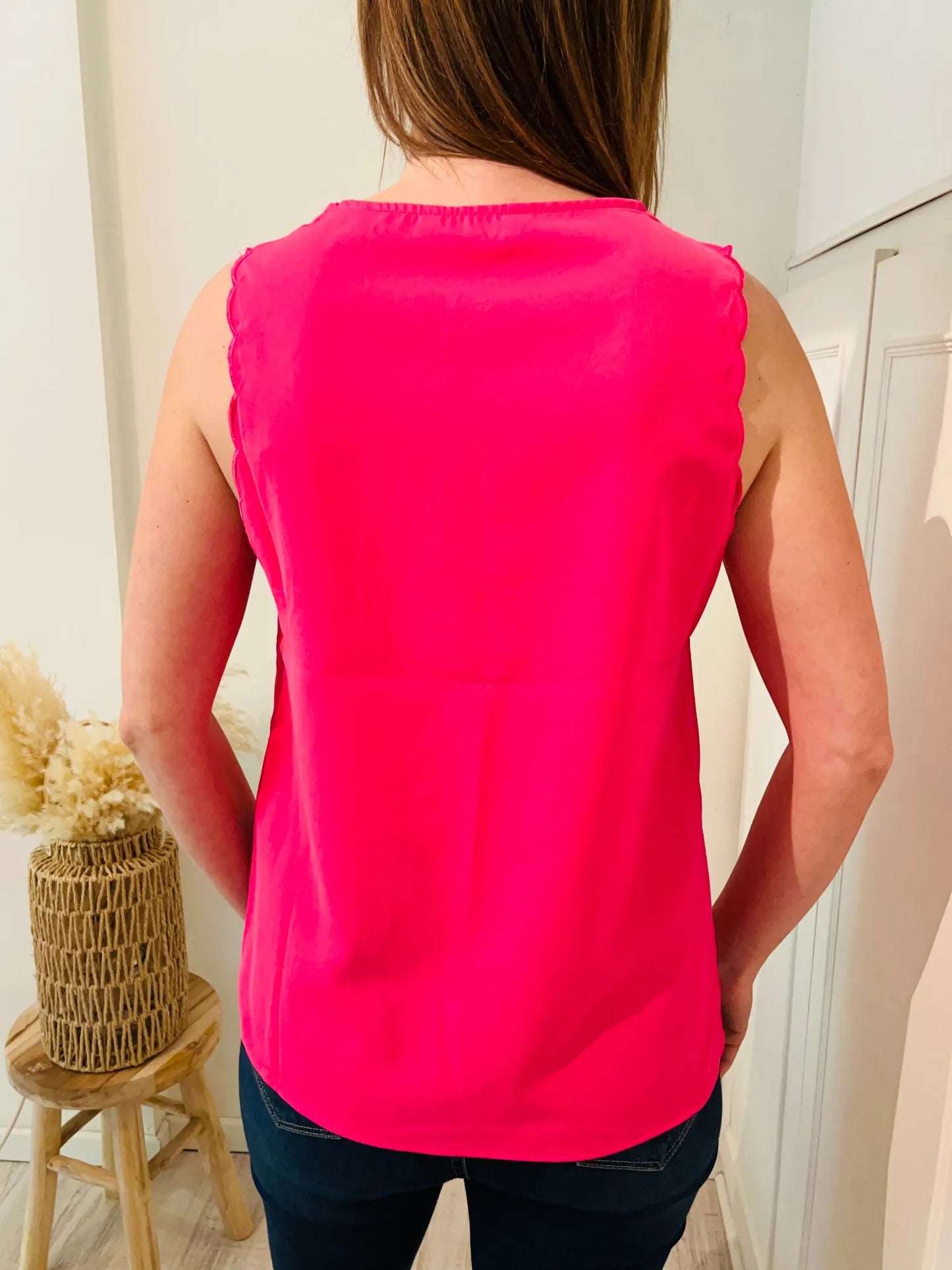 Haut en dentelle rose