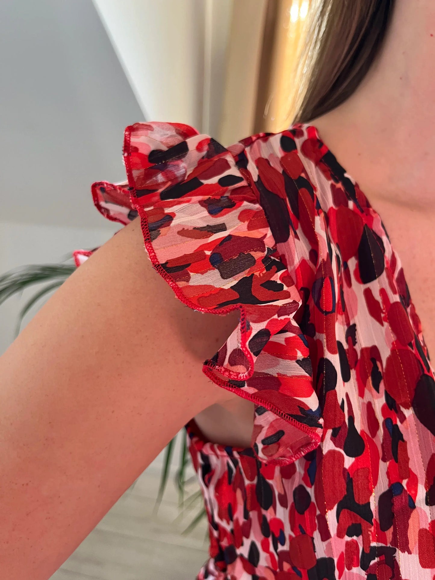 Blouse imprimée sans manches volantée