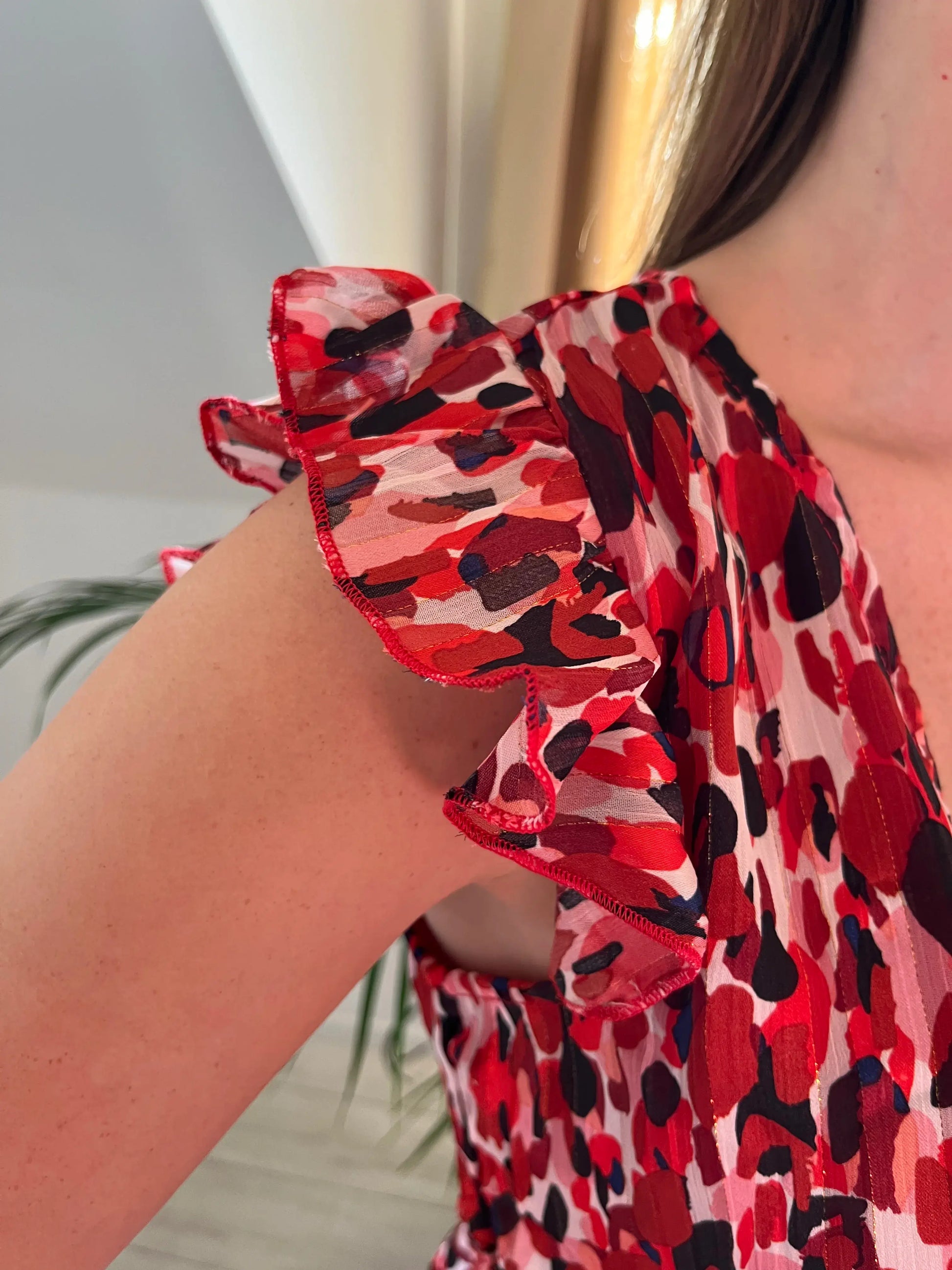 Blouse imprimée sans manches volantée